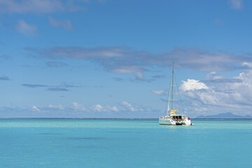 Fototapeta premium Yacht in lagoon, South Pacific, Raiatea, French Polynesia, Oceania