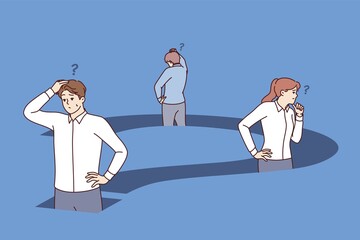 Confused business people are standing inside big question trying to find way out of deadlock. Question prevents team of office employees from moving forward to achieve goals and objectives