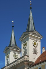 Church towers with tower clock, Basilica St. Quirin, Tegernsee Monastery, Tegernsee, Upper Bavaria,...