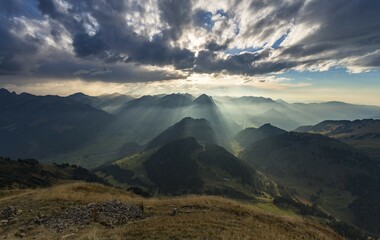 Obraz premium Sunbeams behind the Kanisfluh, view from Diedamskof, Schoppernau, Vorarlberg, Austria, Europe