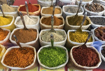 Spices, herbs and curry powders on display at Anjuna Beach Flea Market, Goa, India, Asia