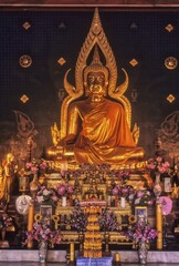 Fototapeta premium Golden image of Buddha in Thailand Monastery, Bodh Gaya, Bihar, India, Asia