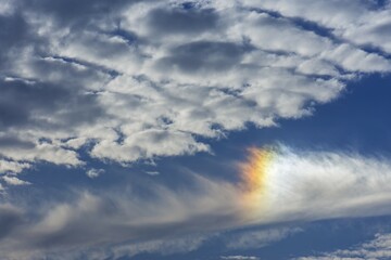 Colored sun reflection on a cloudy sky, Germany, Europe