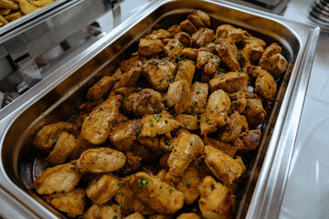 An assortment of appetizers and hot dishes.