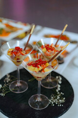 An assortment of appetizers and hot dishes.