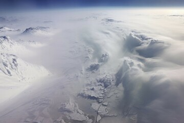 Fototapeta premium Aerial view of the Arctic, snowstorm, winter landscape between ice and snow, haze fog, AI generated