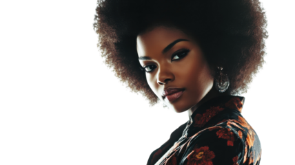 Woman with natural hair posing confidently in floral attire against a bright background