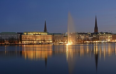 Inner Alster Lake with Alster fountain at the blue hour, Hamburg, Germany, Europe