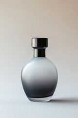 A perfume bottle sitting on a table, perfect for decorating or using as a prop in your scene