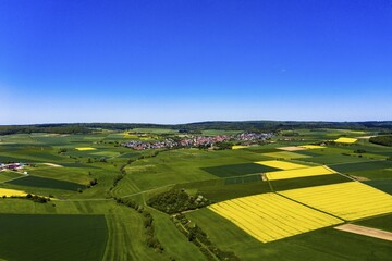 Drone shot, agriculture with cereal fields and flowering rape fields, Usingen, Schwalbach, Hochtaunuskreis, Hesse, Germany, Europe