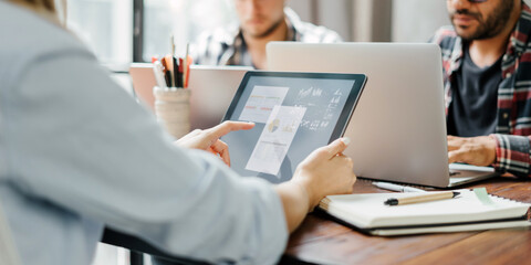 Group of young people working together. Creative business people in modern office