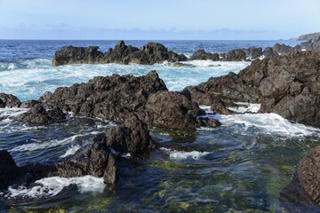 Rocky coastline near Ponta Furada, Faial, Azores, Portugal, Europe