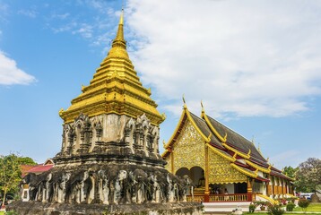 Fototapeta premium Chedi with elephant statues, Wat Chiang Man, Buddhist temple, Chiang Mai, Chiang Mai Province, Northern Thailand, Thailand, Asia