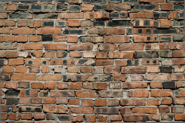 brick wall made of old brown bricks close up