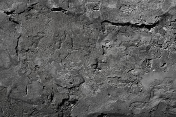 Texture of old gray concrete wall with plaster close-up