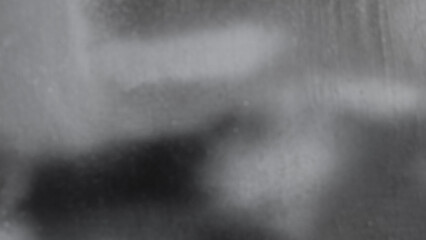 black and white background, in the photo a blurred wall painted in black and white