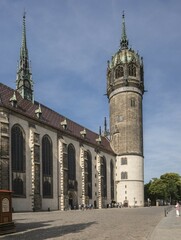 Obraz premium Protestant castle church, also church of the Reformation, place of the posting of the thesis by Martin Luther, UNESCO world heritage site, Luther city Wittenberg, Saxony-Anhalt, Germany, Europe