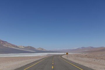 Road leads through Altiplano, San Pedro de Atacama, Antofagasta region, Chile, South America