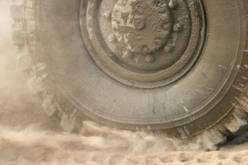 Wheel in dust