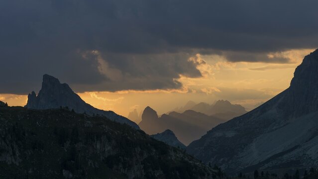 Sunset at Valparola Pass, Hexenberg with summit cross, little Lagazuoi on the right, Dolomites, Alps, Veneto, Italy, Europe