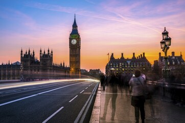 Obraz premium Light trails in front of Big Ben, dusk, evening light, sunset, Houses of Parliament, Westminster Bridge, City of Westminster, London, London region, England, United Kingdom, Europe