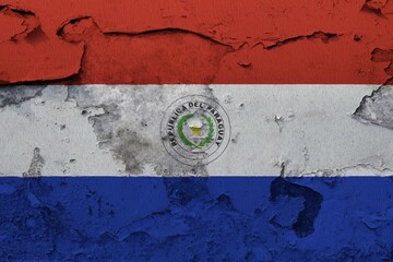 Paraguay Flag painted on the cracked grunge concrete wall