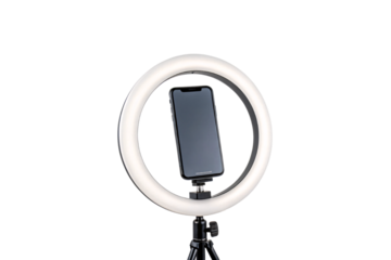 A smartphone stands vertically within a glowing ring light, highlighting the setup for vertical video recording or live streaming, isolated on a transparent background