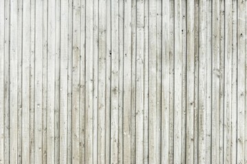 Wooden wall made of horizontally arranged unpainted boards, background image
