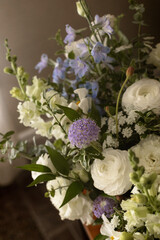 purple and white wedding flower details