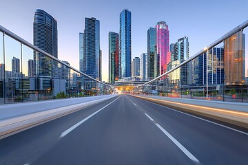 Fototapeta premium A clear, wide view of a sleek bridge spanning a clean asphalt highway, with reflective skyscrapers and colorful lights in the bustling city .