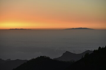 View from Samara Volcano across Teno massif towards La Palma in trade clouds, sunset, Teide National Park, Tenerife, Canary Islands, Spain, Europe