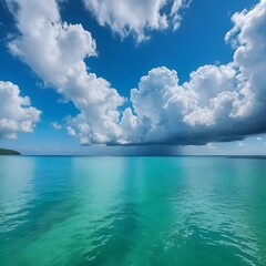 Fototapeta premium Una foto que resalta la armonía entre un mar esmeralda y nubes azules en el cielo. Tranquilo y cautivador. Una obra maestra natural.