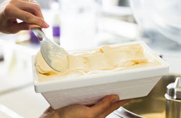 Thermal insulation tray with ice cream preparation process at factory