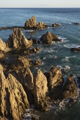 Rocky coast at Arrecife de las Sirenas, Nature Reserve Cabo de Gata-Nijar, Almeria province, Andalusia, Spain, Europe