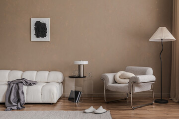 Elegant living room with a boucle sofa, cozy armchair, and minimalist decor. Neutral tones and soft textures create a calming, modern atmosphere.