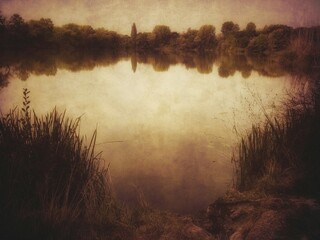 scenic view over swimming lake in Germany with vintage texture filter