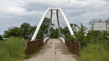 Pedestrian, bicycle and equestrian bridge over the Ombrone, Parco Regionale della Maremma, near...