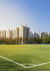 Football field and high-rise buildings in the Märkisches Viertel residential area in Berlin Reinickendorf, Berlin, Germany, Europe © Karl-Heinz Spremberg/imageBROKER