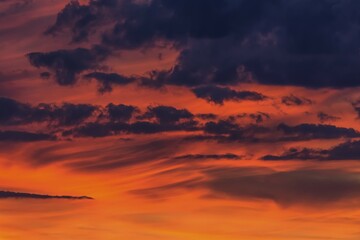 Clouds at the red evening sky after sunset, Germany, Europe
