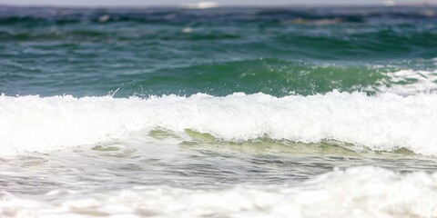 Fototapeta premium risk management analysis training concept. A serene seascape featuring gentle waves rolling onto a sandy shore, creating a peaceful and calming atmosphere.