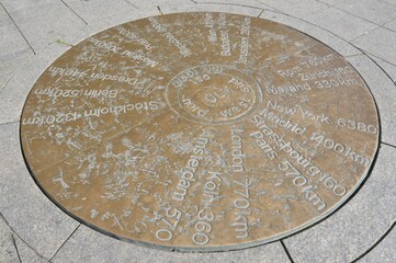 In Muensterplatz square a copper plate shows the distances to other towns, Ulm, Baden-Wuerttemberg, Germany, Europe