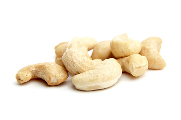 A group of raw cashew nuts arranged on a clean white surface. Ideal for concepts of healthy snacking, vegan diets, or natural food ingredients