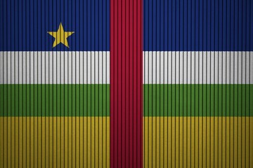 Central African Republic flag painted on the cracked grunge concrete wall