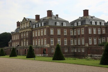 View across one of the lawn parterres to the main building, Nordkirchen Castle, baroque castle complex in southern M&uuml;nsterland, moated castle, Coesfeld district, North Rhine-Westphalia, Germany, Europe