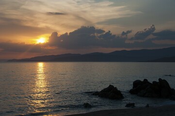 Sunset on the beach of Capu Laurosu, Corsica, France, Europe