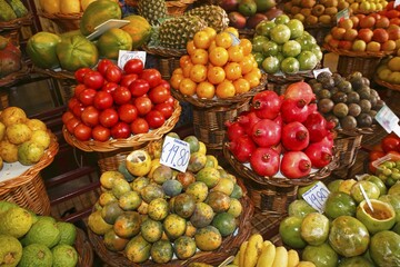 Fruit stall with passion fruit, pomegranates, pineapples and other exotic fruits, Market Hall, Funchal, Madeira, Portugal, Europe