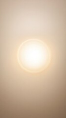Soft Glowing Halo of Light Fading Into Smooth Neutral Background