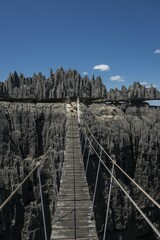 Suspension bridge over canyon, Karst Landscape, National Park Tsingy du Bemaraha, UNESCO World Heritage Site, Mahajanga, Madagascar, Africa