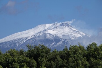 Etna volcano, snowy, seen from the park of Villa Bellini, Province of Catania, Sicily, Italy, Europe