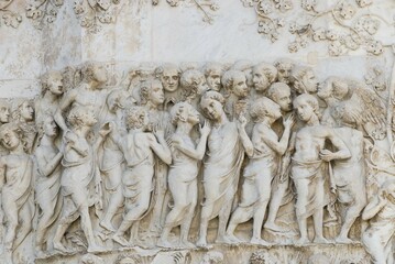 Stone relief, west side of the cathedral in Orvieto, Umbria, Italy, Europe